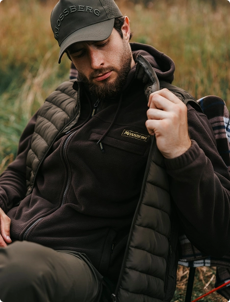 Охотник в одежде Mossberg с технологией THERMOFIBER.
